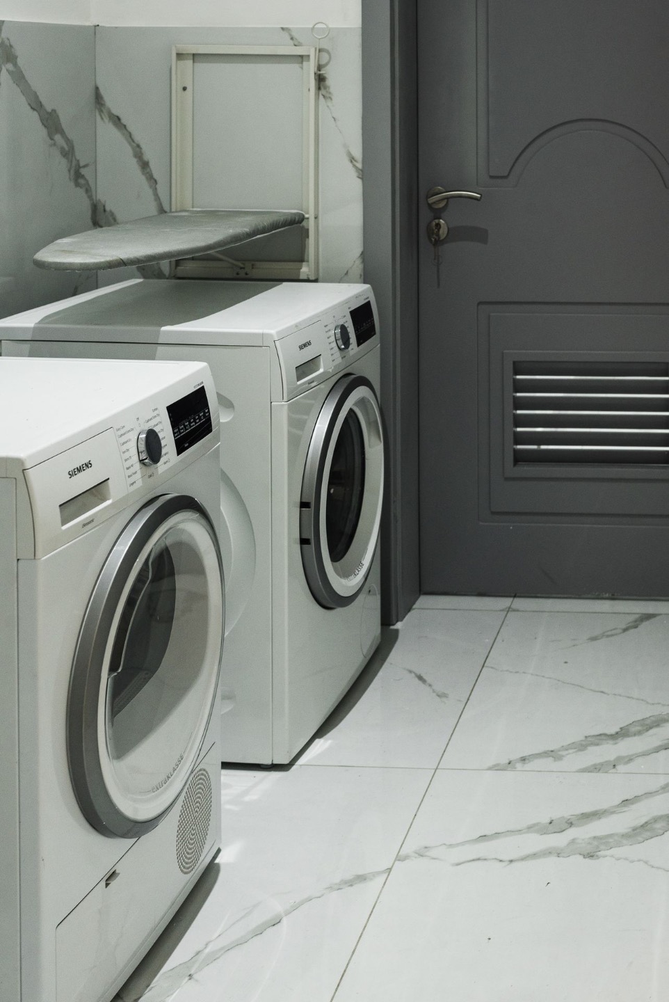 a washer and dryer sitting next to each other